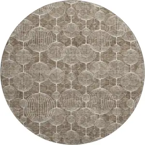 Photo of 8' Chocolate And Beige Geometric Washable Round Rug With UV Protection