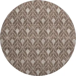 Photo of 8' Chocolate And Beige Geometric Washable Round Rug With UV Protection