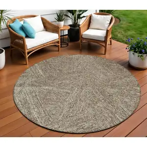 Photo of 8' Chocolate And Beige Round Abstract Washable Indoor Outdoor Area Rug