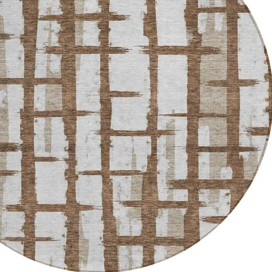 8' Chocolate And Beige Round Striped Washable Indoor Outdoor Area Rug Photo 4