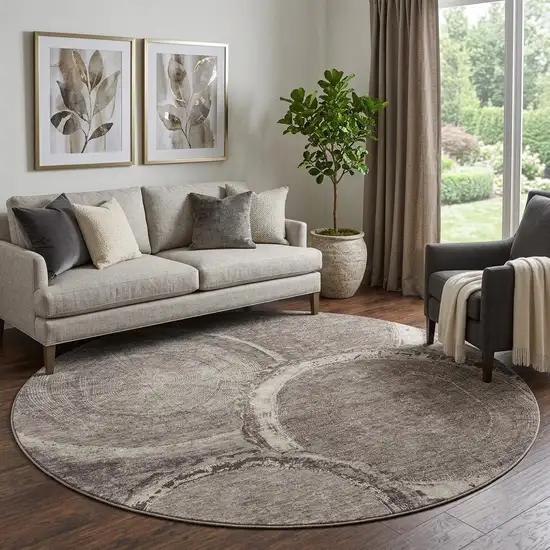 8' Chocolate And Beige Woodland Lodge Washable Round Rug With UV Protection Photo 1