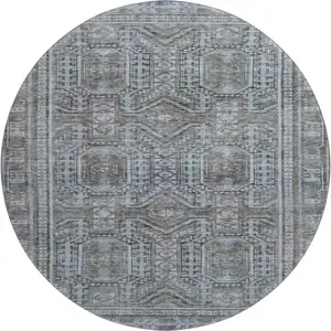 Photo of 8' Chocolate And Blue Geometric Washable Round Rug With UV Protection