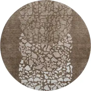 Photo of 8' Chocolate And Ivory Abstract Washable Round Rug With UV Protection
