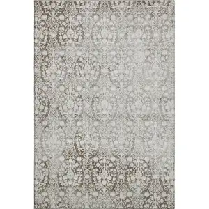 Photo of 8' Chocolate And Ivory Damask Washable Area Rug With UV Protection