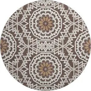 Photo of 8' Chocolate And Ivory Geometric Washable Round Rug With UV Protection