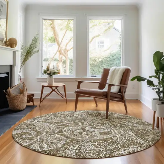 8' Chocolate And Ivory Paisley Washable Round Rug With UV Protection Photo 3
