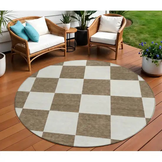 8' Chocolate And Ivory Round Geometric Washable Indoor Outdoor Area Rug Photo 1