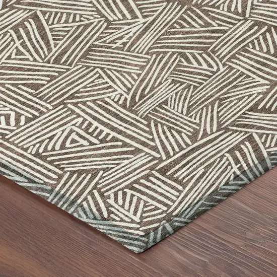 8' Chocolate And Ivory Round Geometric Washable Indoor Outdoor Area Rug Photo 6