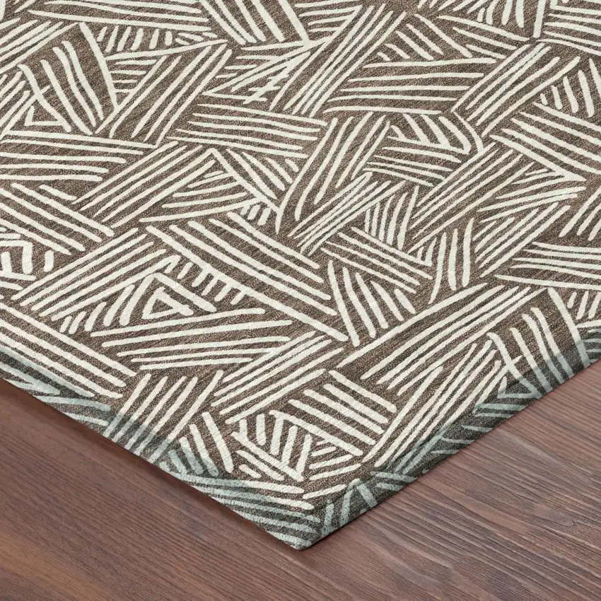 8' Chocolate And Ivory Round Geometric Washable Indoor Outdoor Area Rug Photo 6