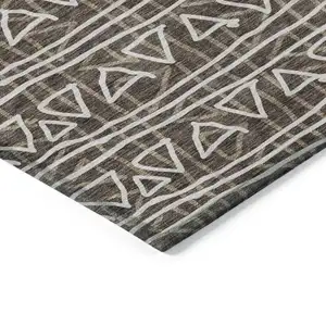Photo of 8' Chocolate And Ivory Round Geometric Washable Indoor Outdoor Area Rug