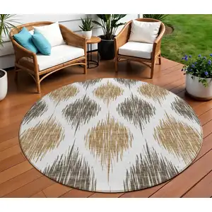 Photo of 8' Chocolate And Ivory Round Ikat Washable Indoor Outdoor Area Rug