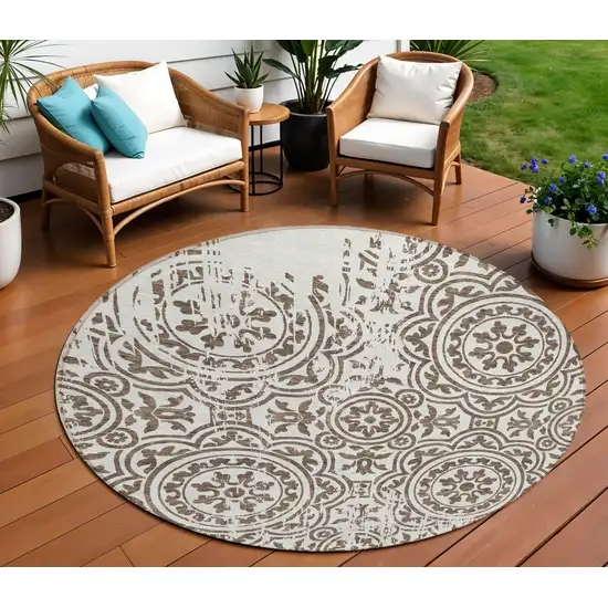 8' Chocolate And Ivory Round Medallion Washable Indoor Outdoor Area Rug Photo 1