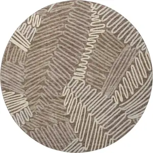 Photo of 8' Chocolate And Taupe Floral Washable Round Rug With UV Protection