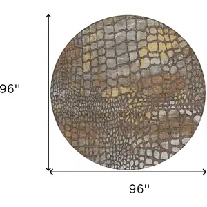 Photo of 8' Chocolate Beige And Copper Round Abstract Washable Indoor Outdoor Area Rug