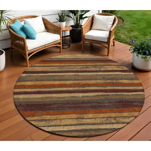 Photo of 8' Chocolate Beige And Copper Round Striped Washable Indoor Outdoor Area Rug