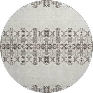 Photo of 8' Chocolate Beige And Ivory Southwestern Washable Round Rug With UV Protection