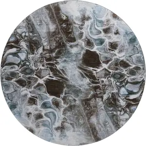Photo of 8' Chocolate Blue And Gray Abstract Washable Round Rug With UV Protection