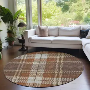 Photo of 8' Chocolate Copper And Gold Round Plaid Washable Indoor Outdoor Area Rug