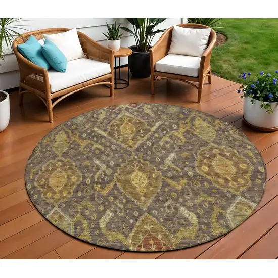 8' Chocolate Gold And Burgundy Round Ikat Washable Indoor Outdoor Area Rug Photo 1