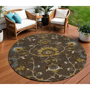 Photo of 8' Chocolate Gold And Gray Round Floral Washable Indoor Outdoor Area Rug