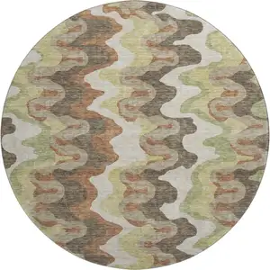 Photo of 8' Chocolate Green And Beige Abstract Washable Round Rug With UV Protection