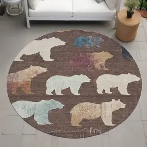 Photo of 8' Chocolate Ivory And Blue Round Animal Print Washable Indoor Outdoor Area Rug