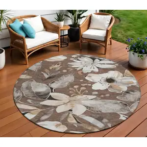 Photo of 8' Chocolate Ivory And Wheat Round Floral Washable Indoor Outdoor Area Rug