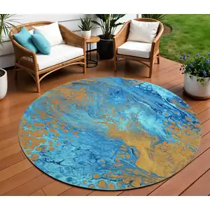 Photo of 8' Cobalt And Copper Round Abstract Washable Indoor Outdoor Area Rug