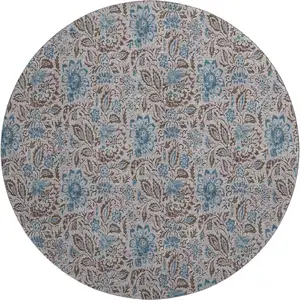 Photo of 8' Coffee And Blue Floral Washable Round Rug With UV Protection
