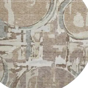 Photo of 8' Coffee Beige And Gray Geometric Washable Round Rug With UV Protection