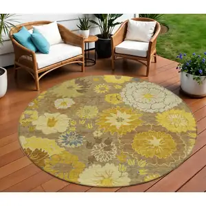 Photo of 8' Coffee Gold And Beige Round Floral Washable Indoor Outdoor Area Rug