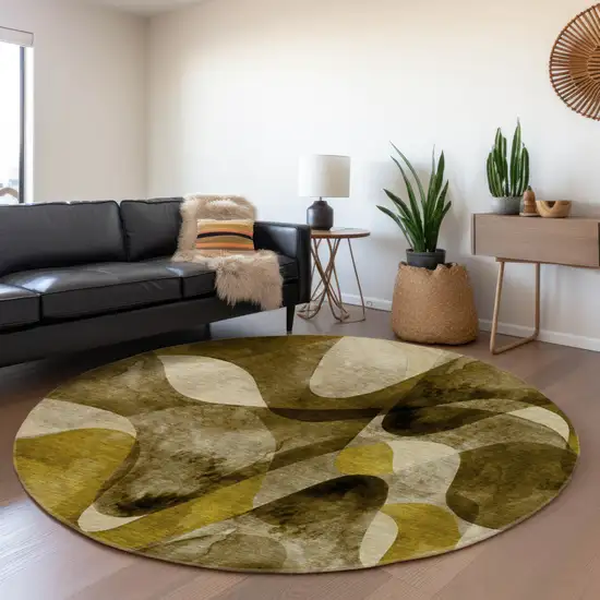 8' Coffee Gold And Ivory Abstract Washable Round Rug With UV Protection Photo 5