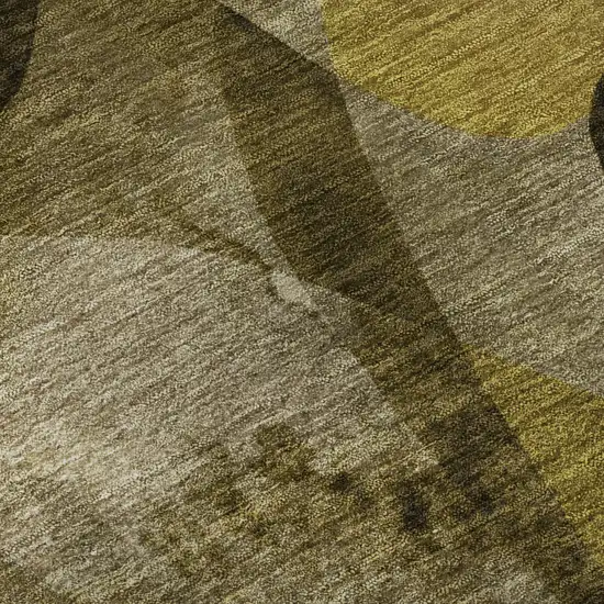 8' Coffee Gold And Ivory Abstract Washable Round Rug With UV Protection Photo 9