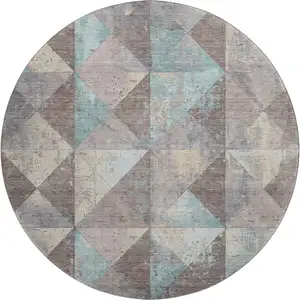 Photo of 8' Coffee Teal And Beige Geometric Washable Round Rug With UV Protection