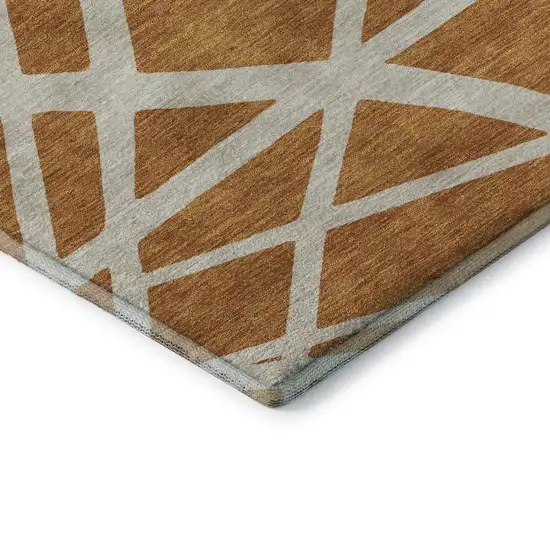 8' Copper And Beige Geometric Washable Round Rug With UV Protection Photo 6