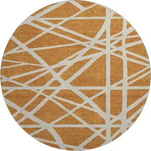 Photo of 8' Copper And Beige Geometric Washable Round Rug With UV Protection