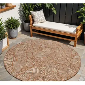 Photo of 8' Copper And Beige Round Floral Washable Indoor Outdoor Area Rug