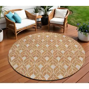 Photo of 8' Copper And Beige Round Geometric Washable Indoor Outdoor Area Rug
