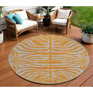 Photo of 8' Copper And Gray Round Animal Print Washable Indoor Outdoor Area Rug