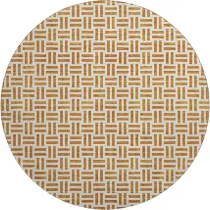 Photo of 8' Copper And Ivory Geometric Washable Round Rug With UV Protection