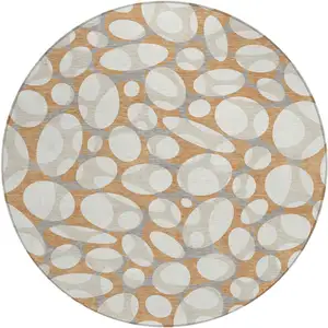 Photo of 8' Copper And Ivory Round Abstract Washable Indoor Outdoor Area Rug