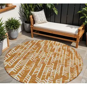 Photo of 8' Copper And Ivory Round Tribal Washable Indoor Outdoor Area Rug