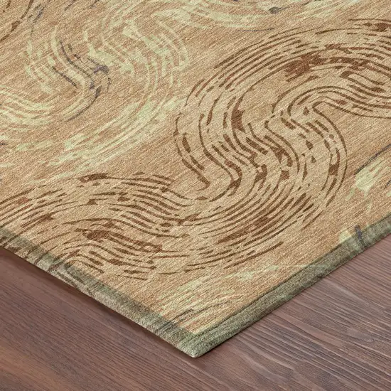 8' Copper And Orange Round Abstract Washable Indoor Outdoor Area Rug Photo 6