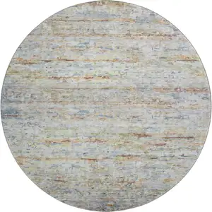 Photo of 8' Copper Beige And Blue Striped Washable Round Rug With UV Protection
