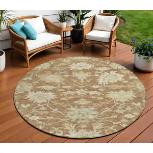 Photo of 8' Copper Green And Ivory Round Floral Washable Indoor Outdoor Area Rug