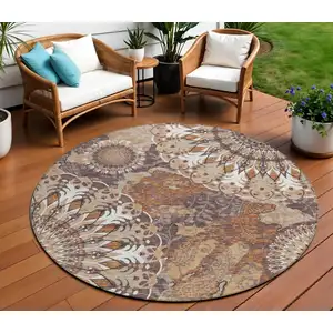 Photo of 8' Copper Ivory And Khaki Round Paisley Washable Indoor Outdoor Area Rug