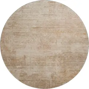 Photo of 8' Coral And Beige Abstract Washable Round Rug With UV Protection