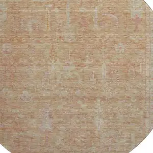 Photo of 8' Coral And Beige Oriental Washable Round Rug With UV Protection