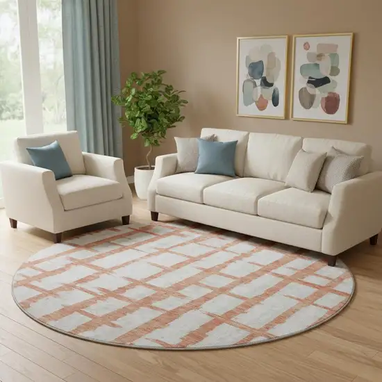 8' Coral And Beige Striped Washable Round Rug With UV Protection Photo 1