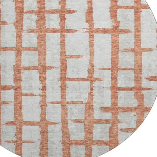 8' Coral And Beige Striped Washable Round Rug With UV Protection Photo 3